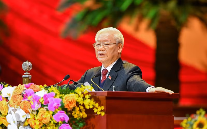 Đồng chí Nguyễn Phú Trọng, Tổng Bí thư, Chủ tịch nước đọc Báo cáo của Ban Chấp hành Trung ương khóa XII về các văn kiện Đại hội XIII của Đảng.