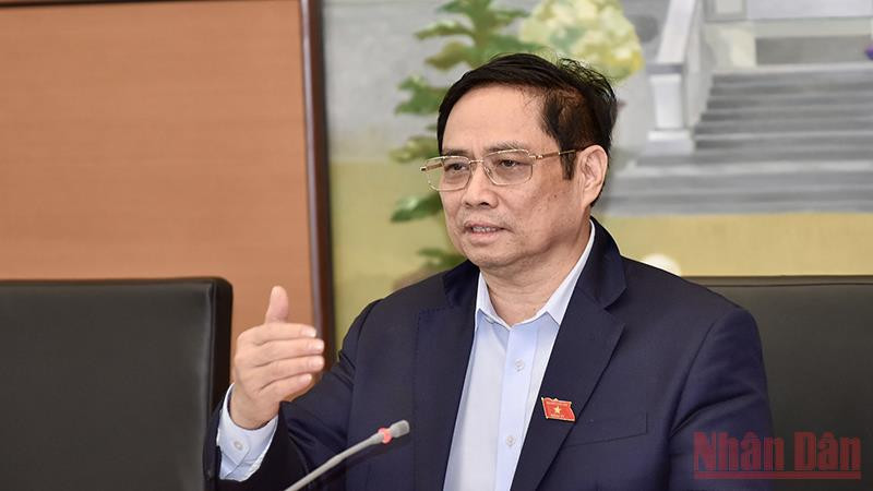 Thủ tướng Chính phủ Phạm Minh Chính phát biểu tại phiên thảo luận tổ, ngày 21/10. Ảnh: Linh Bắc