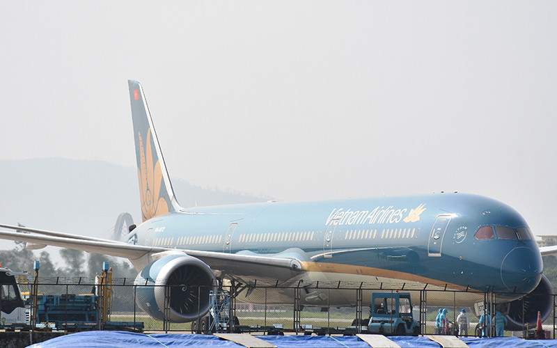 Chuyến bay VN579 chở hơn 340 công dân Việt Nam hạ cánh an toàn tại sân bay quốc tế Đà Nẵng chiều 23-1.