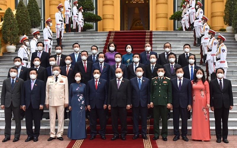 Chủ tịch nước Nguyễn Xuân Phúc, Thủ tướng Phạm Minh Chính, Chủ tịch Quốc hội Vương Đình Huệ và các thành viên Chính phủ, các đại biểu tại buổi lễ. (Ảnh: TRẦN HẢI)