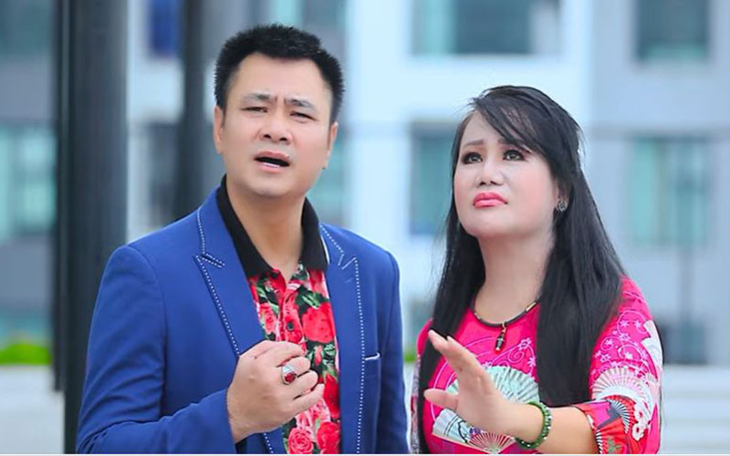 NSND Tự Long và nghệ sĩ Xuân Hồng trong MV "Chặn dịch kiên cường thành phố yêu thương".