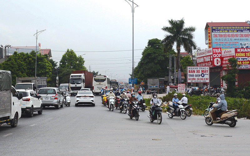 Ảnh minh họa: Quốc lộ 18, đoạn qua xã Phương Liễu, Quế Võ, Bắc Ninh. (Ảnh: Báo Bắc Ninh)