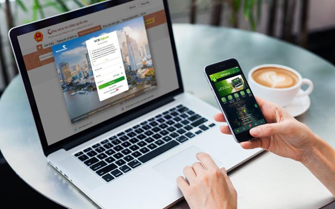 Vietcombank cung cấp dịch vụ để các khách hàng trải nghiệm ngay tại buổi Lễ khai trương và công bố dịch vụ công thứ 1.000 trên Cổng dịch vụ Công quốc gia.