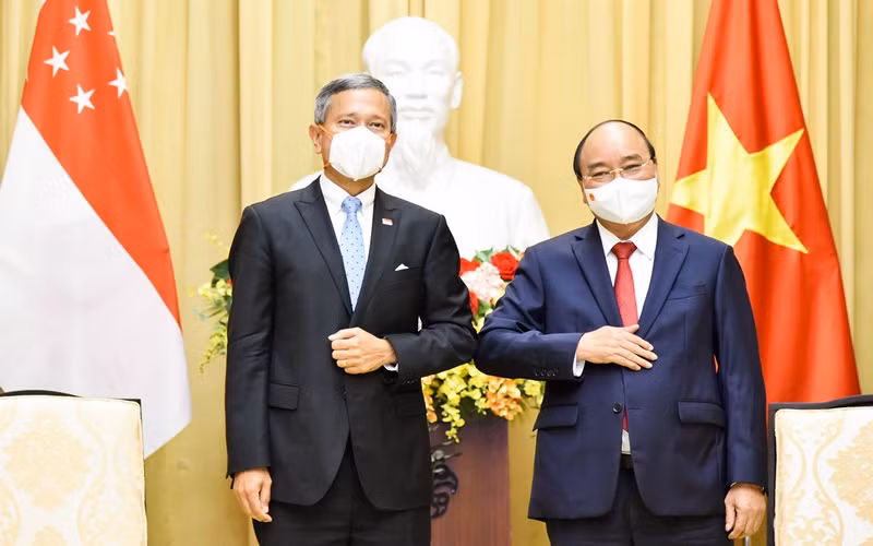 Chủ tịch nước Nguyễn Xuân Phúc tiếp Bộ trưởng Ngoại giao Singapore Vivian Balakrishnan. (Ảnh: Bộ Ngoại giao)