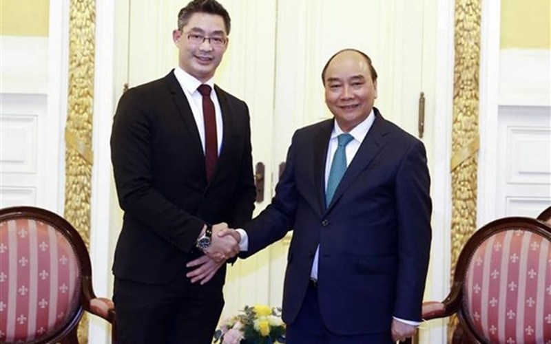 Chủ tịch nước Nguyễn Xuân Phúc tiếp Tiến sĩ Philipp Rosler. (Ảnh: TTXVN)