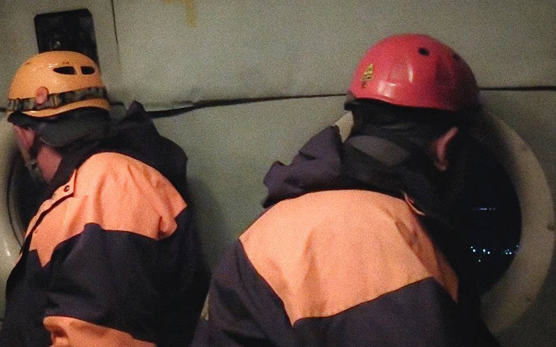 Lực lượng cứu hộ tìm kiếm máy bay mất tích. (Ảnh: TASS)