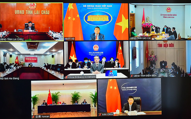 Hội thảo trao đổi trực tuyến Việt Nam-Trung Quốc về kinh nghiệm xóa đói giảm nghèo. Ảnh: BNG