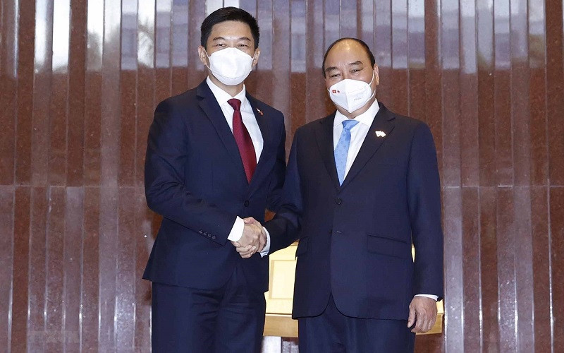 Chủ tịch nước Nguyễn Xuân Phúc hội kiến Chủ tịch Quốc hội Singapore Tan Chuan-Jin. (Ảnh: TTXVN)