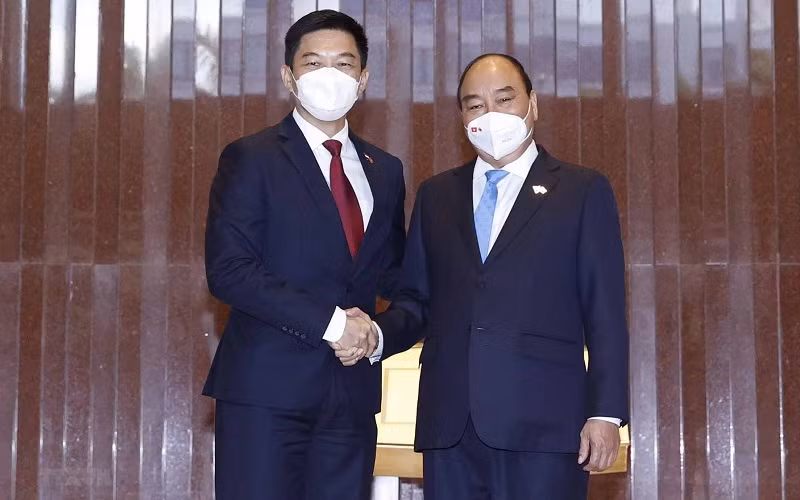 Chủ tịch nước Nguyễn Xuân Phúc hội kiến Chủ tịch Quốc hội Singapore Tan Chuan-Jin. (Ảnh: TTXVN)