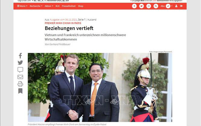 Báo Thế giới trẻ (Junge Welt) của Đức đăng tin về chuyến thăm Pháp của Thủ tướng Phạm Minh Chính. (Ảnh: TTXVN)