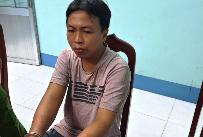 Đối tượng Đặng Quốc Hiệp tại Công an xã Hòa Thành. (Ảnh: Công an cung cấp)