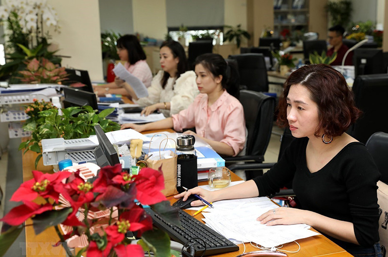 Hoạt động kế toán tại Kho bạc Nhà nước Hà Nội. (Ảnh: Phạm Hậu/TTXVN)