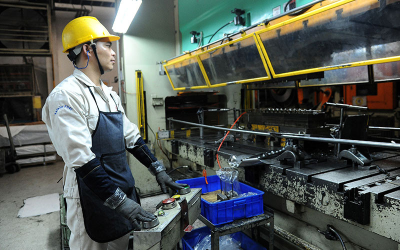 Dây chuyền sản xuất tại Công ty TNHH Công nghiệp chính xác Việt Nam 1, Khu công nghiệp Khai Quang, Vĩnh Phúc. (Ảnh THANH HÀ) 