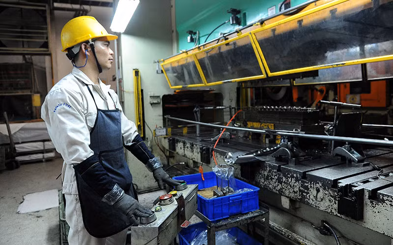 Dây chuyền sản xuất tại Công ty TNHH Công nghiệp chính xác Việt Nam 1, Khu công nghiệp Khai Quang, Vĩnh Phúc. (Ảnh THANH HÀ) 