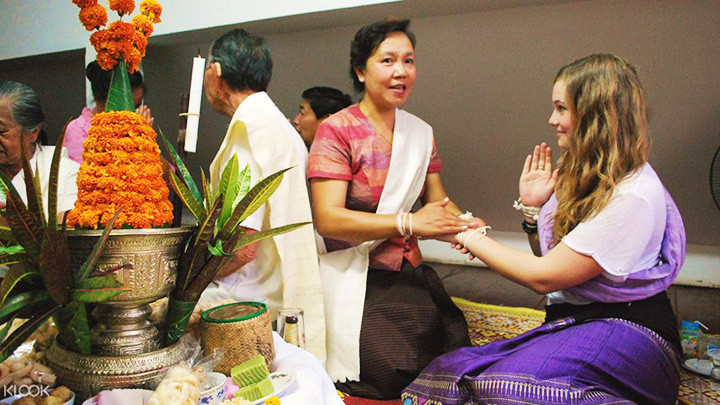 Lễ hội Baci ở Lào. Ảnh: KLOOK