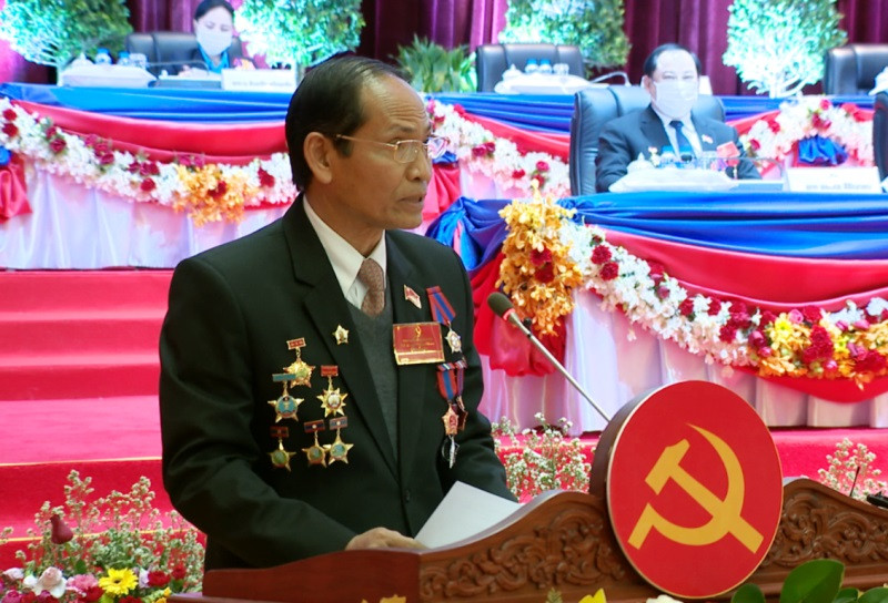 Đại diện Ban bầu cử của Đại hội thông báo một số quy định tại Đại hội, ngày 14-1.