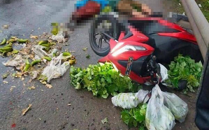 Hiện trường vụ tai nạn thương tâm. (Ảnh do cơ quan Công an cung cấp)