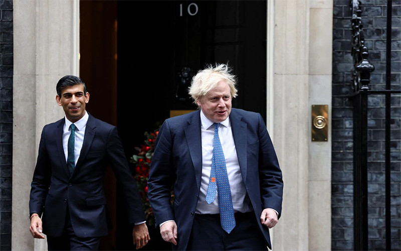Thủ tướng Boris Johnson và Bộ trưởng Tài chính Rishi Sunak. (Ảnh: Reuters)