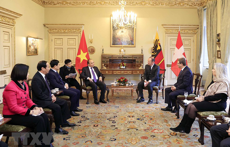 Chủ tịch nước gặp Thống đốc bang Geneva Serge Dal Busco. (Ảnh: TTXVN)