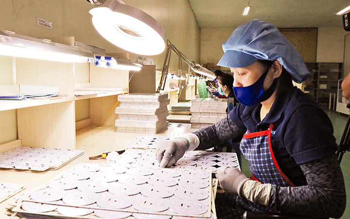 Lao động tại khu công nghiệp ở Bắc Ninh (Ảnh: Thái Sơn).