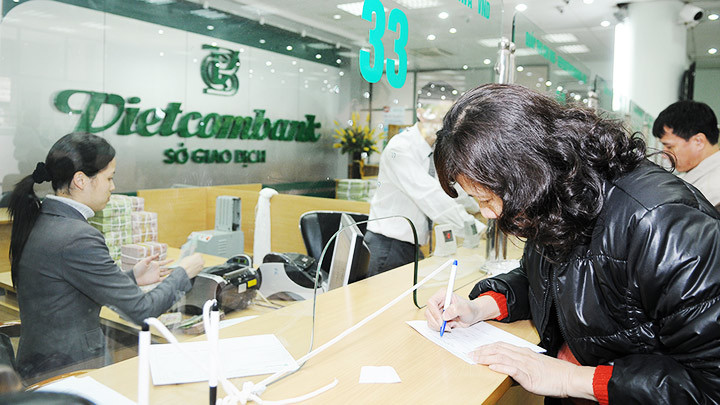 Phần lớn các lô trái phiếu doanh nghiệp đều được phát hành và mua bởi các ngân hàng. Ảnh: NGUYỆT ANH