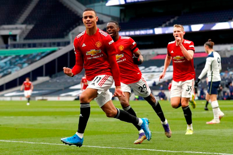 MU ngược dòng đánh bại Tottenham 3-1 đêm chủ nhật, 11-4. (Ảnh: Getty Images)