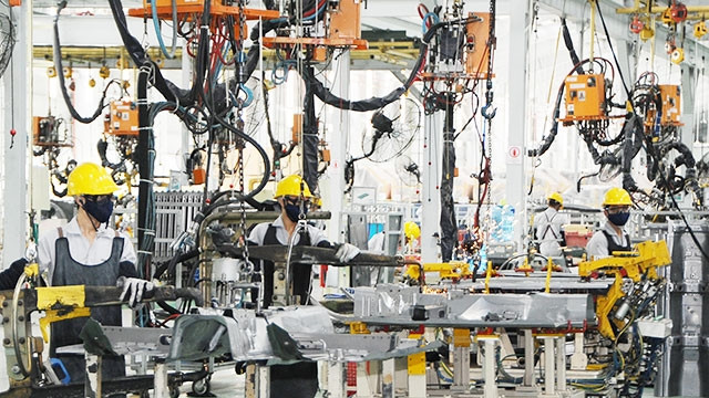 Để tận dụng lợi ích từ CPTPP, doanh nghiệp cần cải thiện năng lực cạnh tranh. Ảnh: LAM ANH