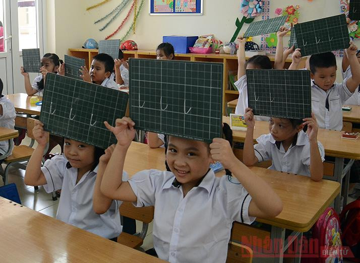 Học sinh lớp 1. Ảnh: DUY LINH