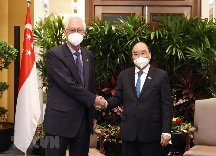 Chủ tịch nước Nguyễn Xuân Phúc tiếp Nguyên Thủ tướng Singapore Goh Chok Tong. (ẢNH: THỐNG NHẤT/TTXVN)