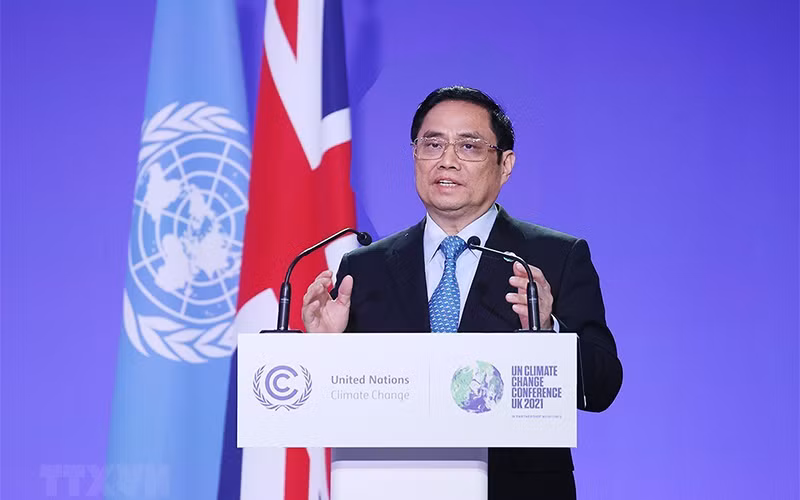 Thủ tướng Phạm Minh Chính phát biểu tại Hội nghị lần thứ 26 các bên tham gia Công ước khung của Liên hợp quốc về biến đổi khí hậu (COP26). (Ảnh: Dương Giang/TTXVN)