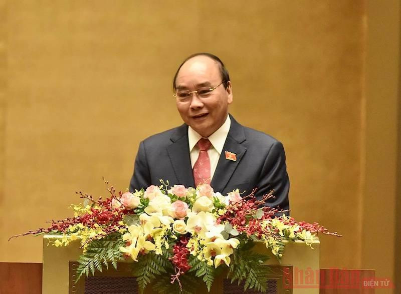 Thủ tướng Chính phủ Nguyễn Xuân Phúc trình bày Báo cáo Công tác nhiệm kỳ 2016-2021 của Chính phủ, sáng 24-3 (Ảnh: TRẦN HẢI)