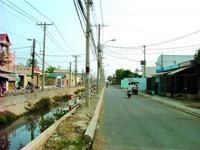Nhờ người dân hiến đất, đoạn đường cặp kênh Hiệp Tân đã được mở rộng nâng cấp khang trang.