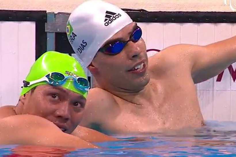 Võ Thanh Tùng (trái) không thành công ở vòng loại 200m tự do. (Ảnh: FBNV)