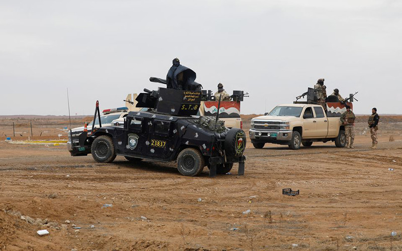 Xe của lực lượng an ninh Iraq tập trung gần biên giới Iraq-Syria, ngày 27/1/2022. (Ảnh: Reuters)
