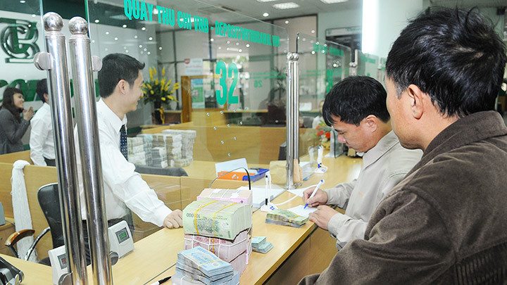 Các hoạt động tín dụng được siết chặt để hạn chế rủi ro. Ảnh: NGUYỆT ANH