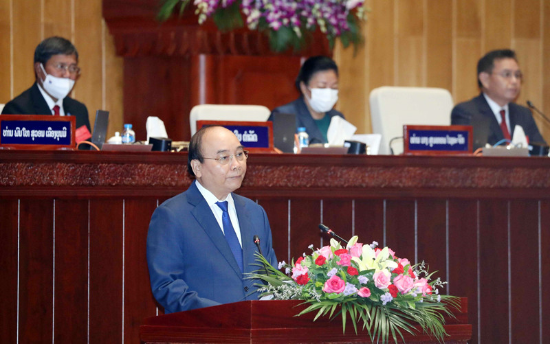 Chủ tịch nước Nguyễn Xuân Phúc phát biểu tại kỳ họp thứ nhất, Quốc hội Lào khóa IX. Ảnh: TTXVN