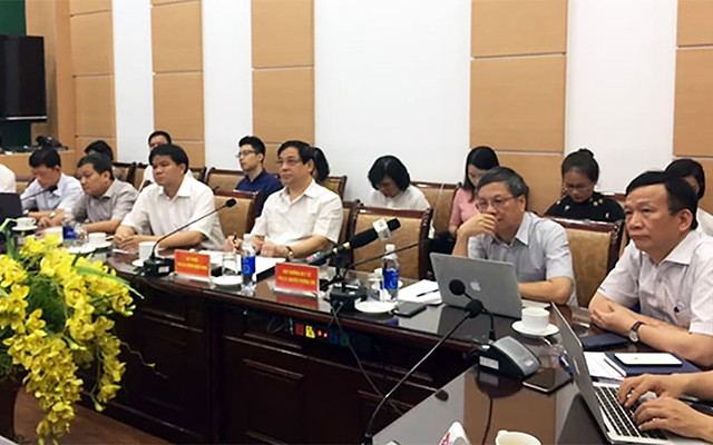 Hội đồng chuyên môn hội chẩn phương án điều trị người bệnh thứ 91. Ảnh: LÊ HẢO