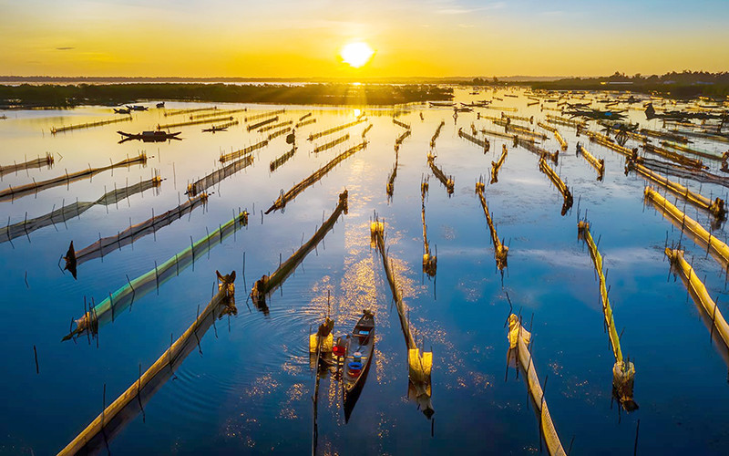 Bình minh trên phá Tam Giang (Thừa Thiên Huế). Ảnh: Nguyễn Quang Ngọc
