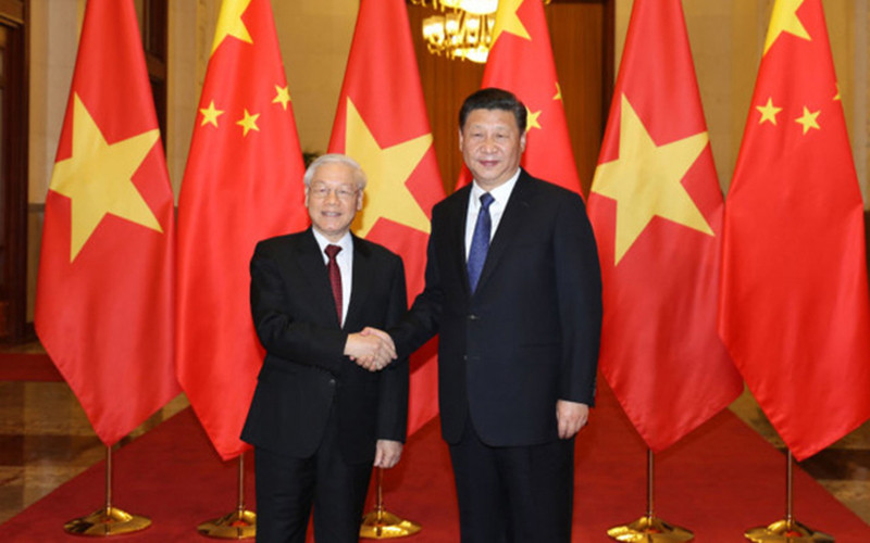 Tổng Bí thư Nguyễn Phú Trọng và Tổng Bí thư, Chủ tịch nước Trung Quốc Tập Cận Bình. Ảnh: TTXVN