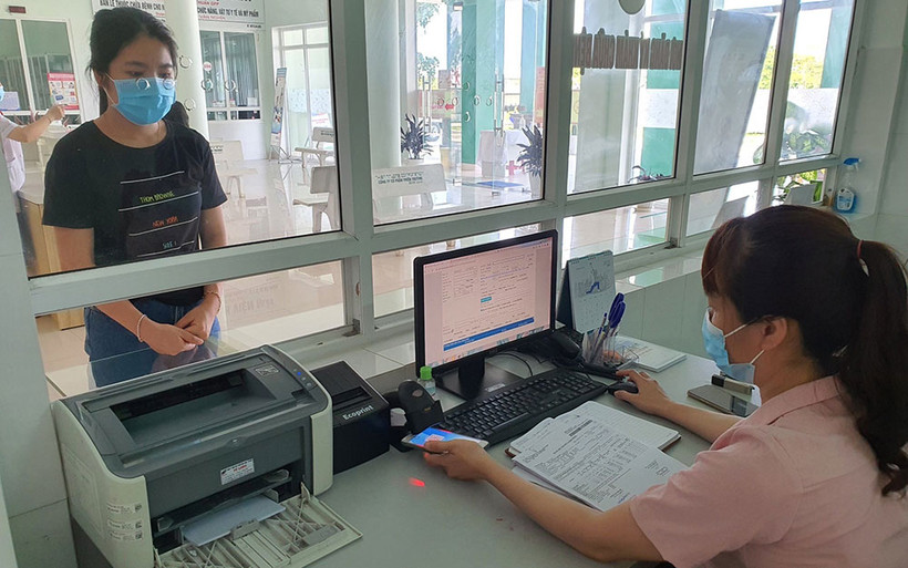 Đề xuất duy trì thẻ BHYT cho người lao động bị mất việc làm. ẢNh: TÂM TRUNG