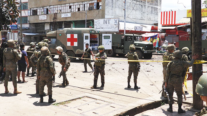 Hiện trường một vụ tiến công khủng bố do Abu Sayyaf tiến hành tại Philippines. Ảnh: AP