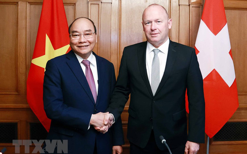 Chủ tịch nước Nguyễn Xuân Phúc hội kiến Chủ tịch Hội đồng Quốc gia Liên bang Thụy Sĩ Andreas Aebi (Ảnh: TTXVN)