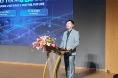 Tiến sĩ Đinh Công Khải, Phó Giám đốc Đại học Kinh tế Thành phố Hồ Chí Minh phát biểu tại hội thảo.