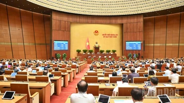 Quốc hội biểu quyết thông qua Luật sửa đổi, bổ sung một số điều của Luật Tiêu chuẩn và quy chuẩn kỹ thuật. (Ảnh: DUY LINH)