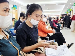 Quét mã QR để xem kết quả khám, chữa bệnh tại Bệnh viện T.Ư Quân đội 108. Ảnh: NAM NGUYỄN