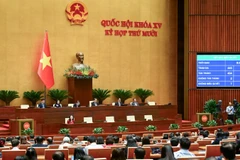 Với 434/443 đại biểu có mặt tán thành, chiếm tỷ lệ 91,75% tổng số đại biểu, Quốc hội thông qua Luật An ninh mạng. (Ảnh: DUY LINH)