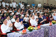 Các đại biểu tham dự Chương trình "Về nguồn-hướng tới tương lai" tại xã Tân Trào, tỉnh Tuyên Quang. (Ảnh: DUY LINH)