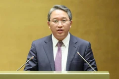 Bộ trưởng Tư pháp Nguyễn Hải Ninh trình bày Tờ trình Dự thảo Nghị quyết của Quốc hội về một số cơ chế, chính sách đặc thù, vượt trội để thực hiện đột phá phát triển giáo dục và đào tạo. (Ảnh: DUY LINH)