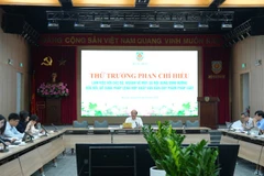 Quang cảnh cuộc làm việc do Thứ trưởng Tư pháp Phan Chí Hiếu chủ trì. (Ảnh: TL)
