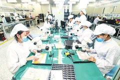 Dây chuyền sản xuất bảng mạch điện tử tại nhà máy của Công ty TNHH 4P ở tỉnh Hưng Yên. (Ảnh: ĐĂNG ANH)